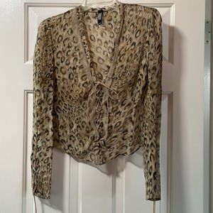 Silk top with leather ties on sleeves and bodice